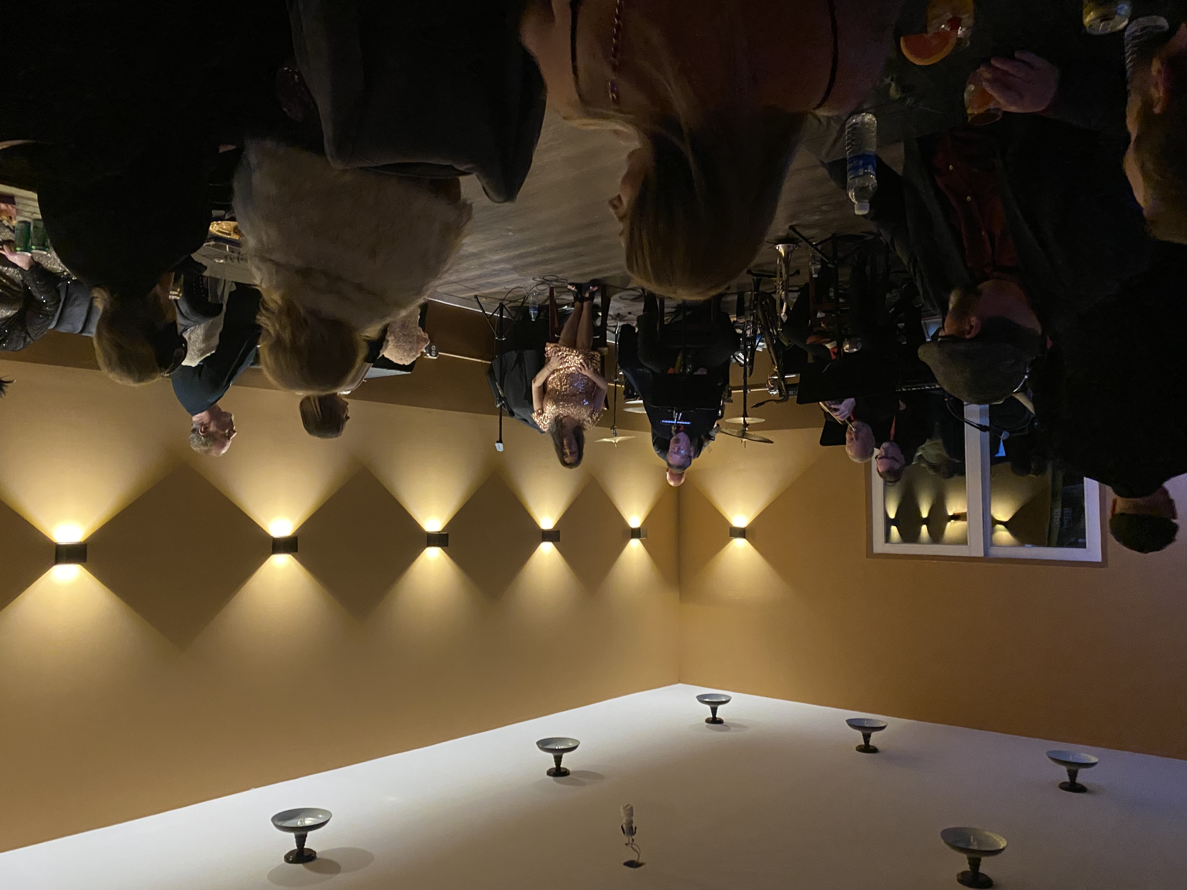 A picture of attendees watching The Little Big Band Group.