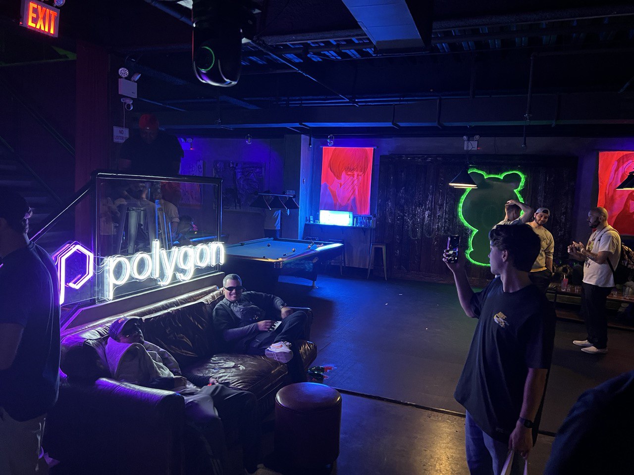 A picture of the neon Polygon sign at the Sour Mouse
